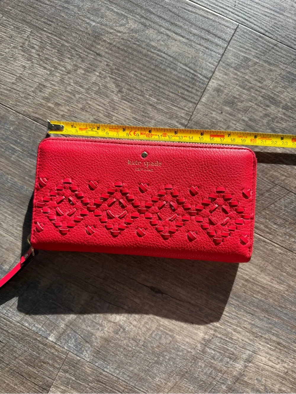 kate spade red leather zip-around wallet